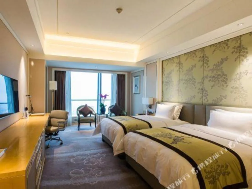 Bed in Ming Du Lakeside Hotel Nanning