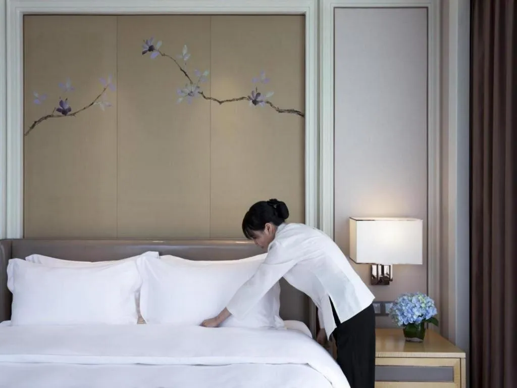 Bed in Ming Du Lakeside Hotel Nanning