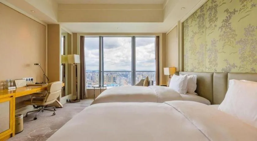 Bed in Ming Du Lakeside Hotel Nanning