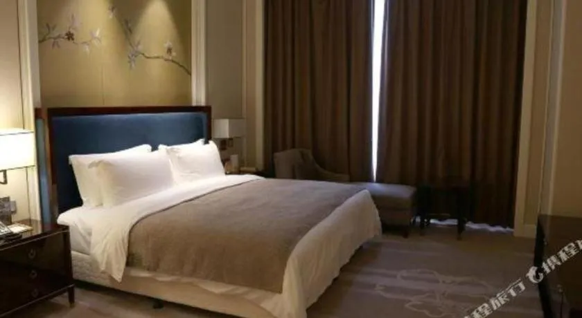 Bed in Ming Du Lakeside Hotel Nanning