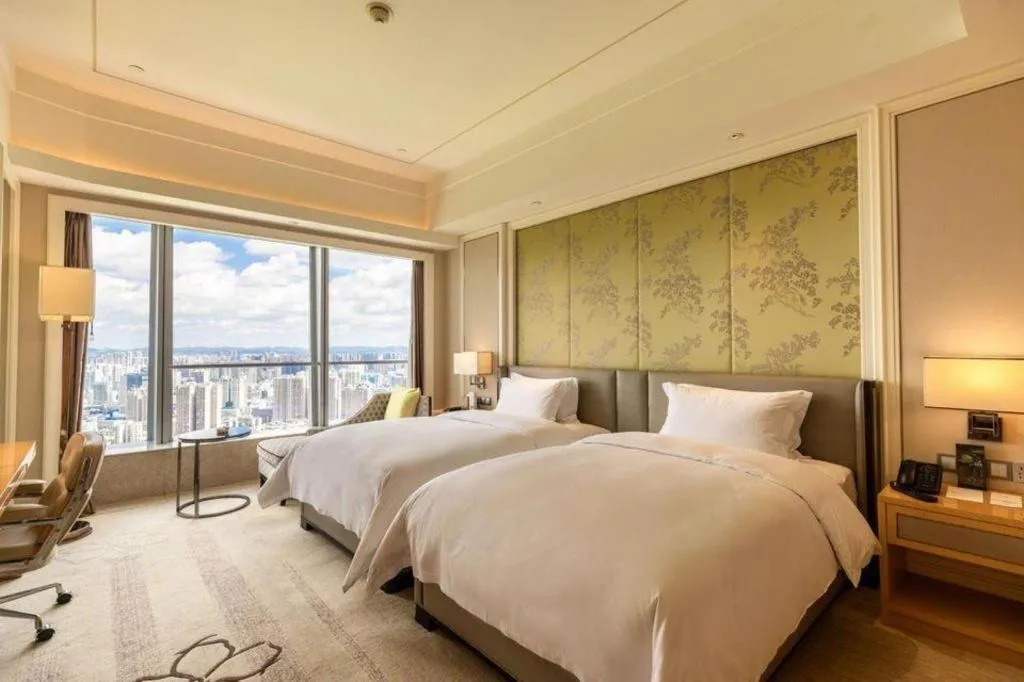 Bed in Ming Du Lakeside Hotel Nanning