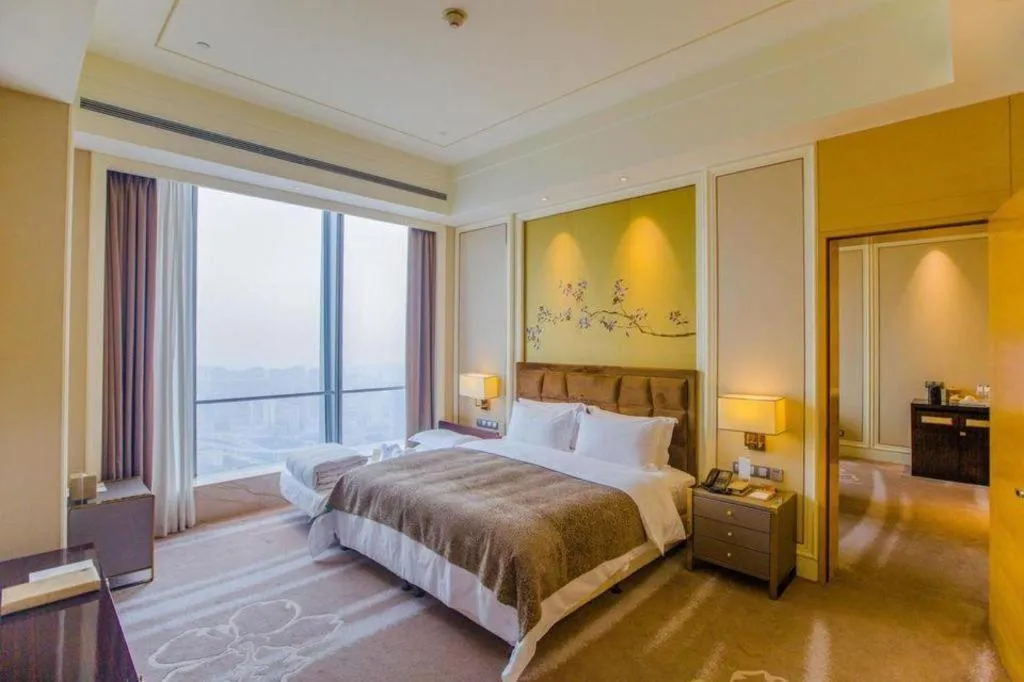 Bed in Ming Du Lakeside Hotel Nanning