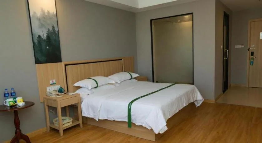 Bed in GreenTree Inn Jiansu Nantong Tongzhouwan Huanghe Road Business Hotel
