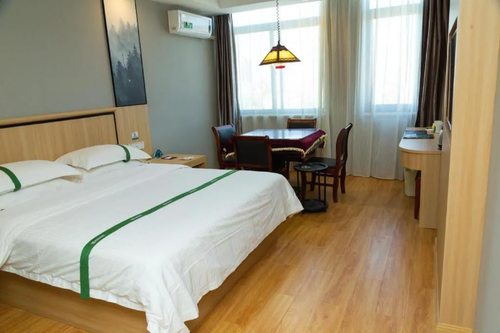 Bed in GreenTree Inn Jiansu Nantong Tongzhouwan Huanghe Road Business Hotel