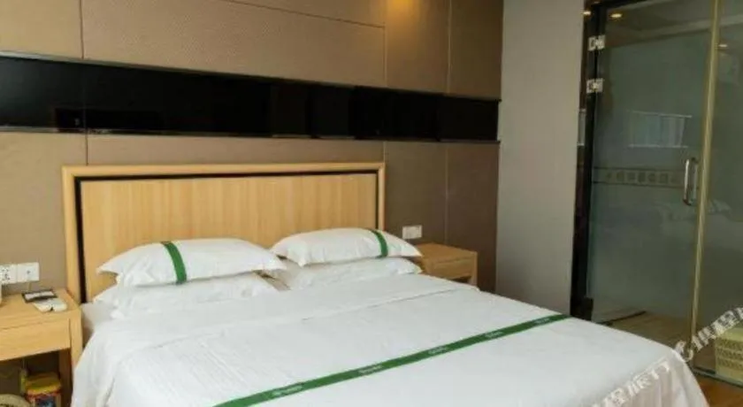 Bed in GreenTree Inn Jiansu Nantong Tongzhouwan Huanghe Road Business Hotel