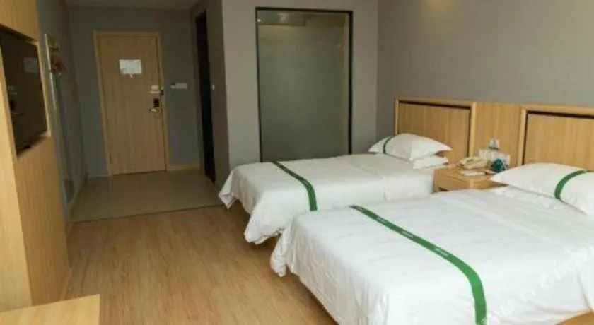 Bed in GreenTree Inn Jiansu Nantong Tongzhouwan Huanghe Road Business Hotel