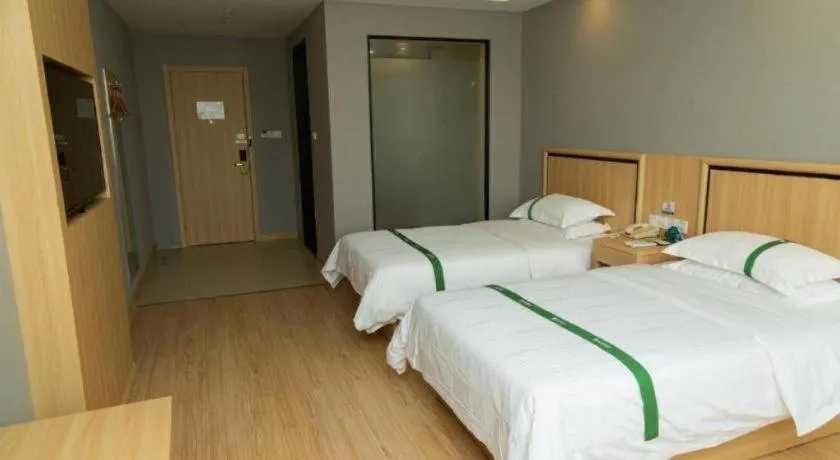 Bed in GreenTree Inn Jiansu Nantong Tongzhouwan Huanghe Road Business Hotel