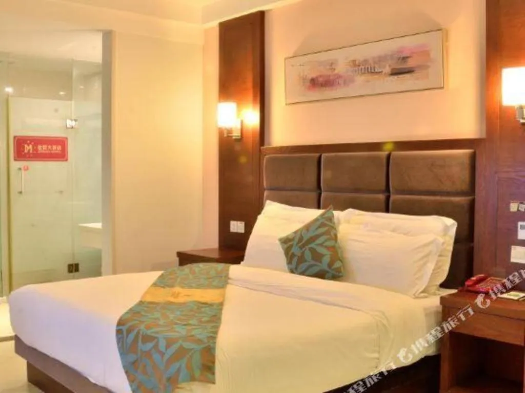 Bed in Qionghai Jin Mao Hotel