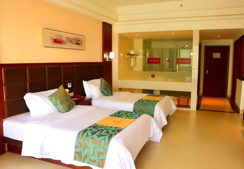 Bed in Qionghai Jin Mao Hotel