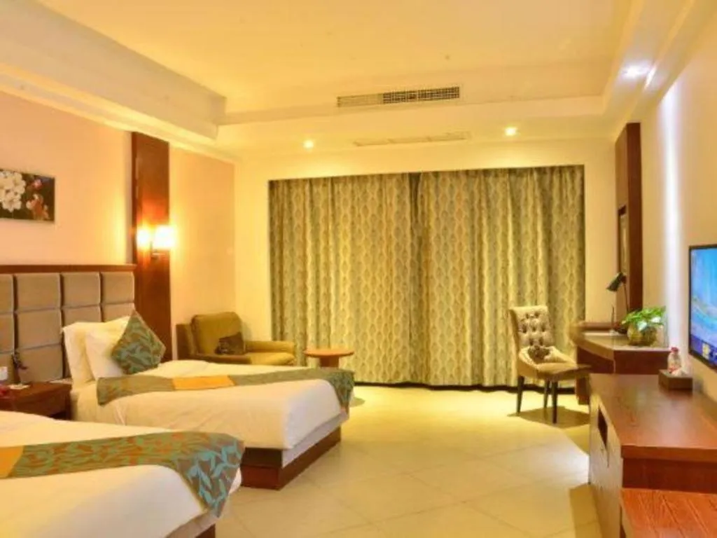 Bed in Qionghai Jin Mao Hotel