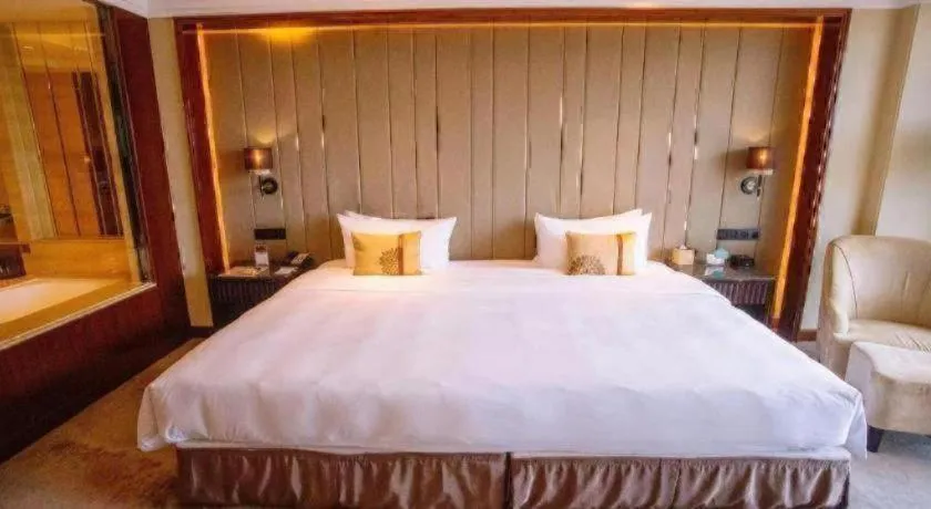 Bed in Wyndham Grand Plaza Royale Xianglin Shaoyang