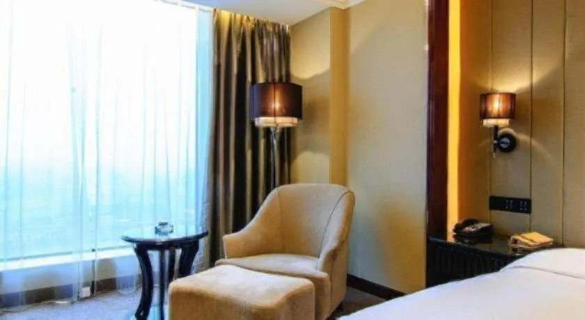 Bed in Wyndham Grand Plaza Royale Xianglin Shaoyang