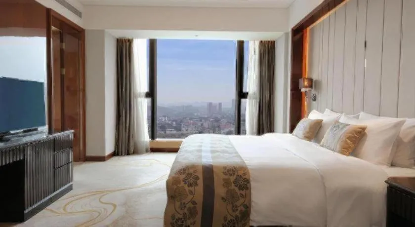Bed in Wyndham Grand Plaza Royale Xianglin Shaoyang