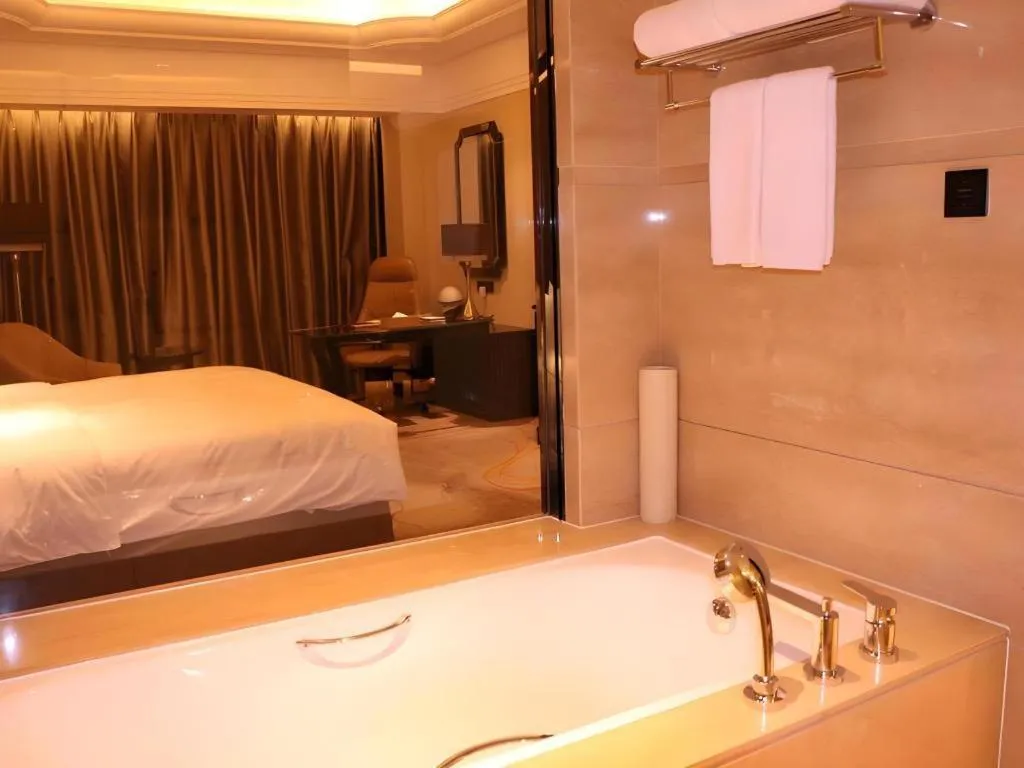 Bed in Wyndham Grand Plaza Royale Xianglin Shaoyang