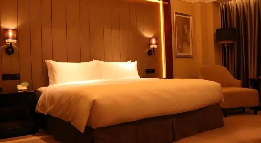 Bed in Wyndham Grand Plaza Royale Xianglin Shaoyang