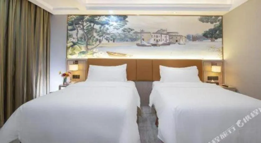 Bed in Vienna Hotel Tianjin Huaming