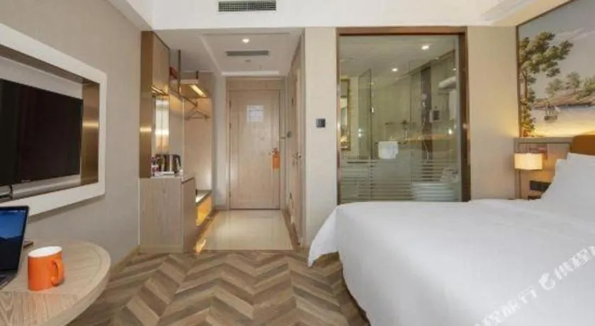 Bed in Vienna Hotel Tianjin Huaming