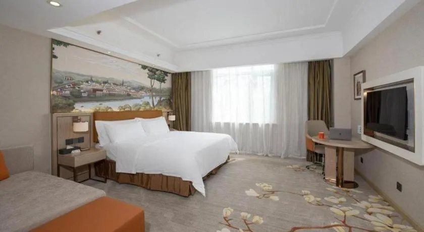 Bed in Vienna Hotel Tianjin Huaming