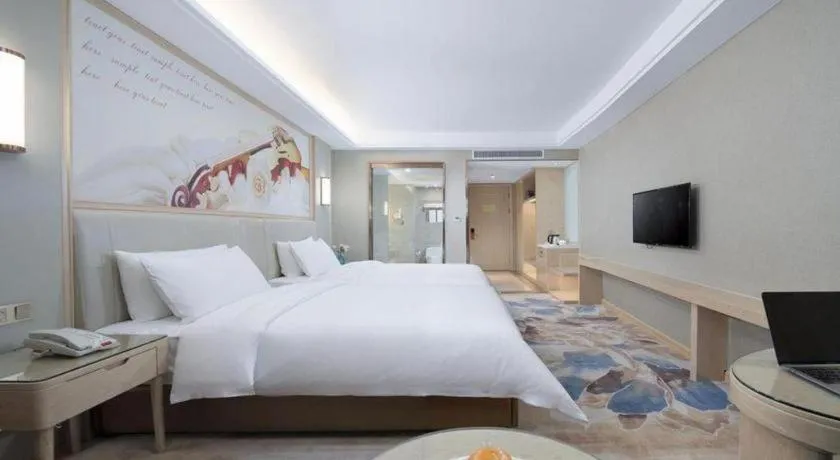 Bed in Vienna Hotel Tianjin Huaming