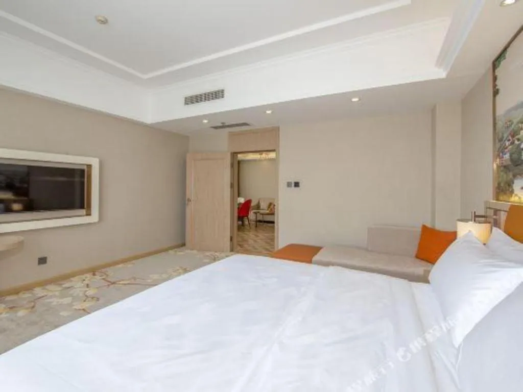 Bed in Vienna Hotel Tianjin Huaming