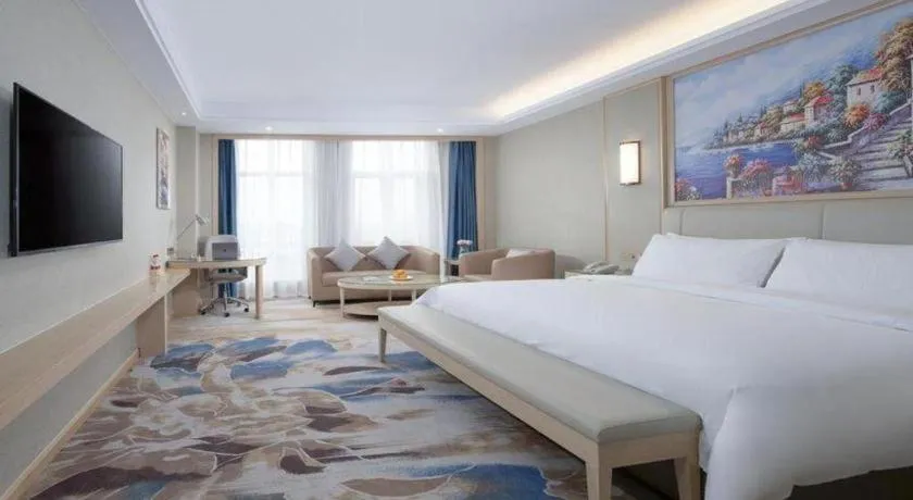 Bed in Vienna Hotel Tianjin Huaming