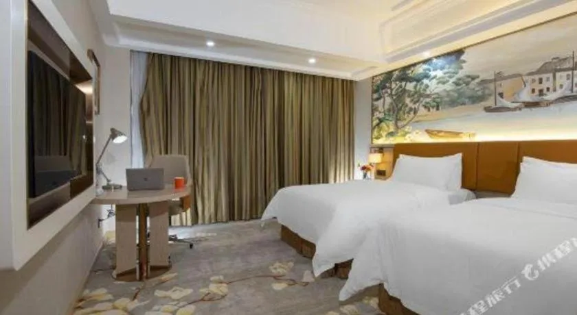 Bed in Vienna Hotel Tianjin Huaming