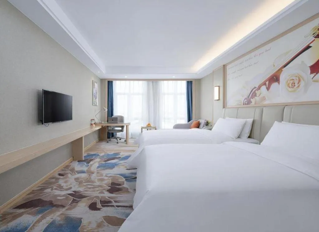 Bed in Vienna Hotel Tianjin Huaming