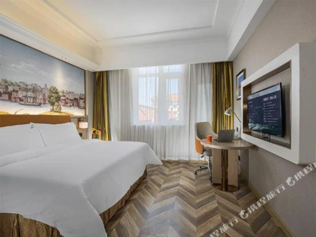 Bed in Vienna Hotel Tianjin Huaming