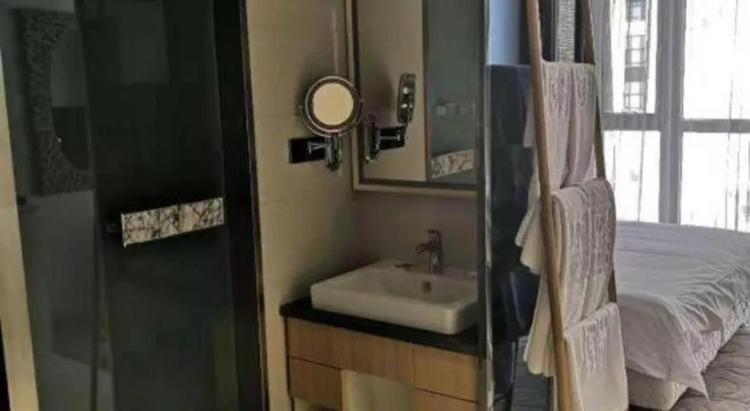 Bed in Harbin Ju Jian Hotel