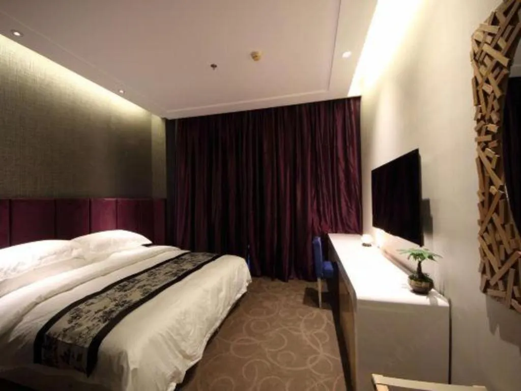 Bed in Harbin Ju Jian Hotel