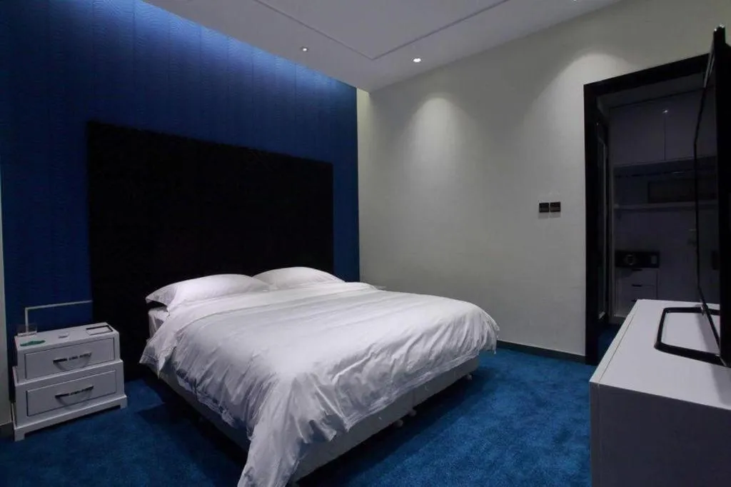 Bed in Harbin Ju Jian Hotel