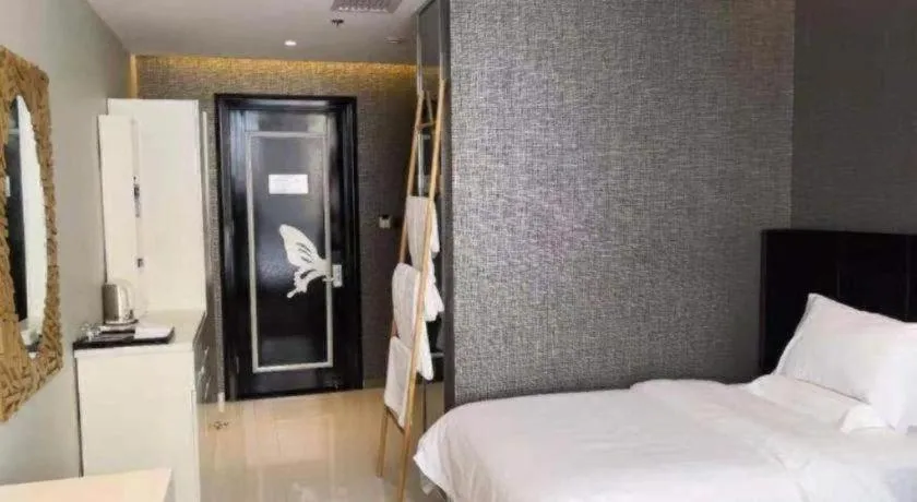 Bed in Harbin Ju Jian Hotel