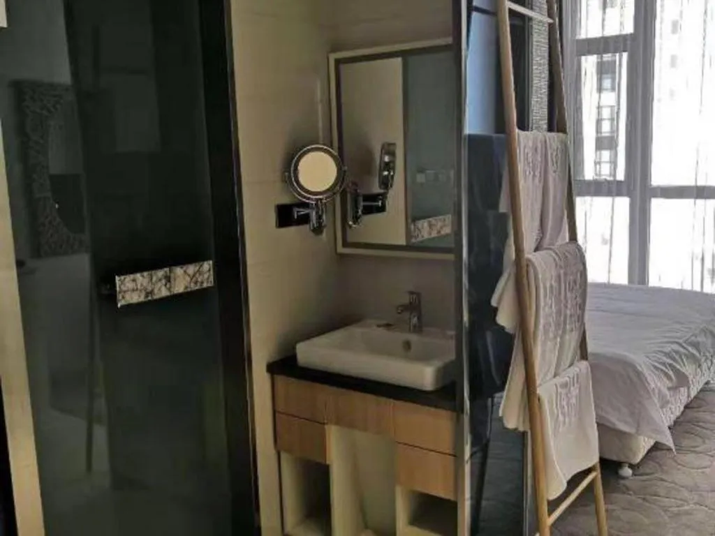 Bed in Harbin Ju Jian Hotel