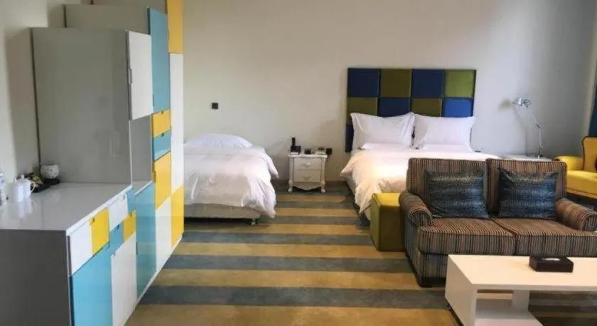 Bed in Harbin Ju Jian Hotel