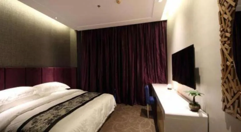 Bed in Harbin Ju Jian Hotel