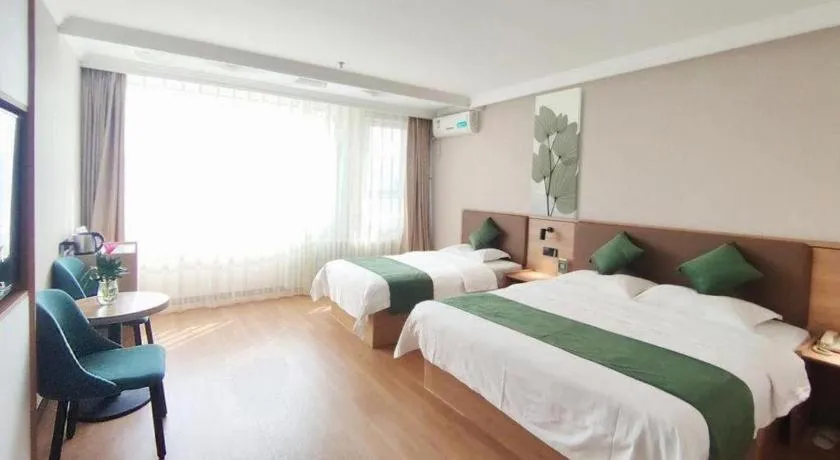 Bed in GreenTree Inn Beijing Daxing Xingye Street Liyuan Business Hotel