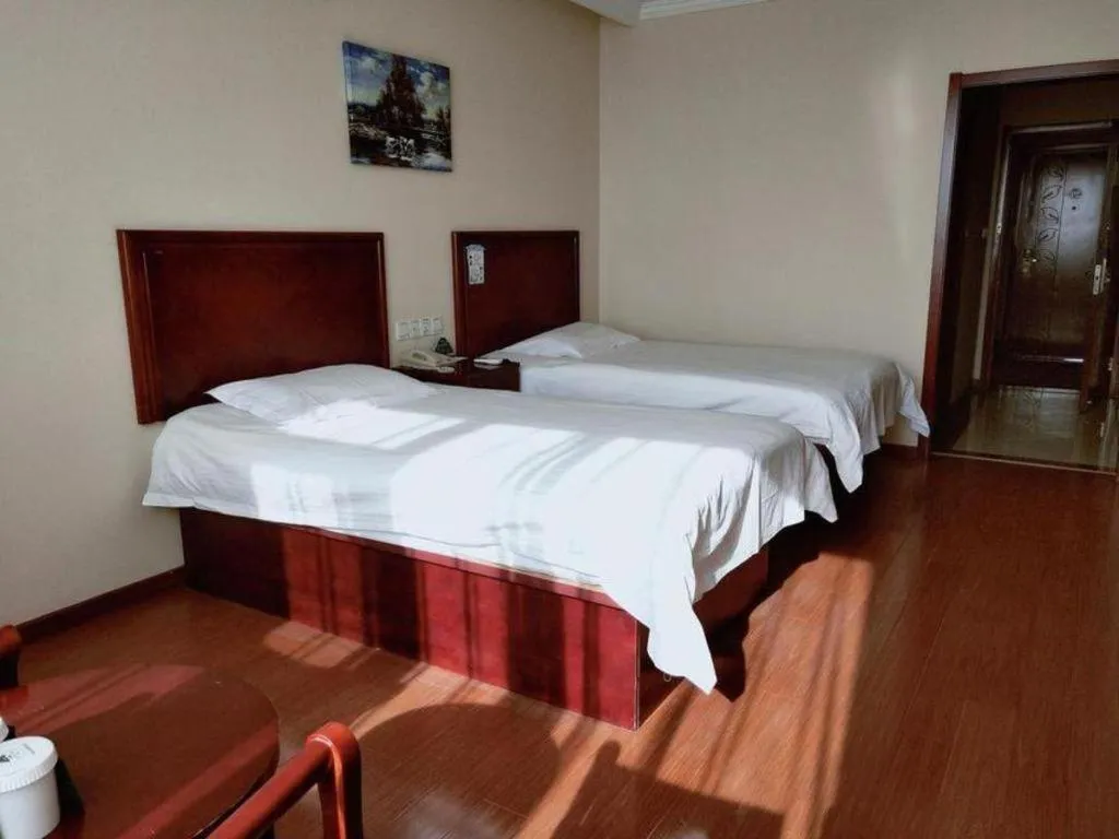 Bed in GreenTree Inn Beijing Daxing Xingye Street Liyuan Business Hotel