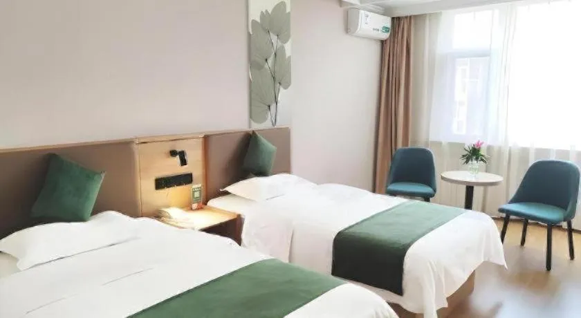Bed in GreenTree Inn Beijing Daxing Xingye Street Liyuan Business Hotel