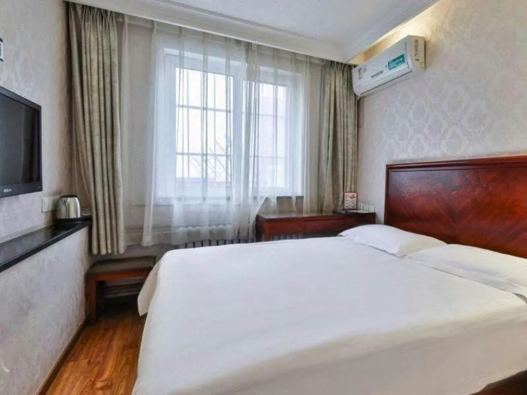 Bed in GreenTree Inn Beijing Daxing Xingye Street Liyuan Business Hotel