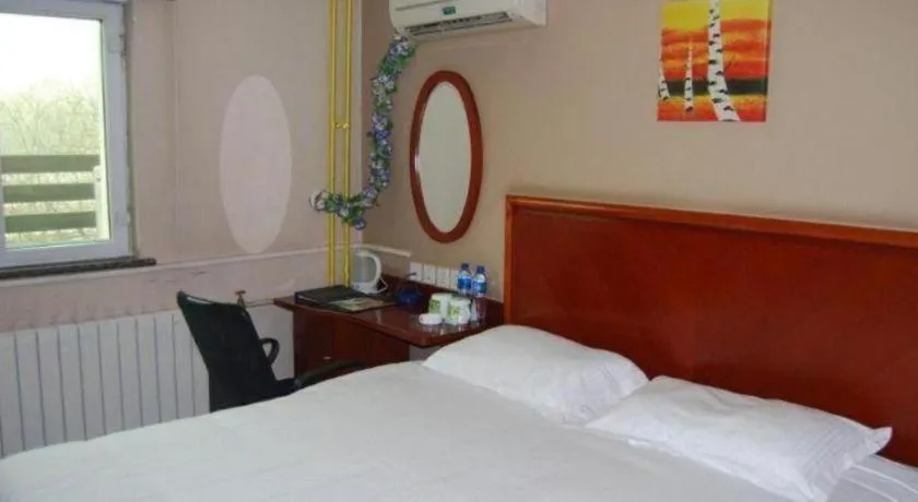 Bed in GreenTree Inn Beijing Daxing Xingye Street Liyuan Business Hotel