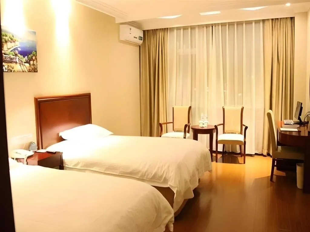 Bed in GreenTree Inn Beijing Daxing Xingye Street Liyuan Business Hotel