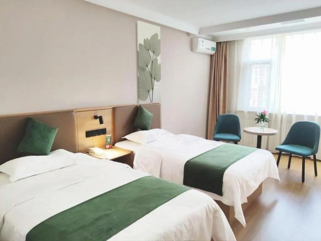 Bed in GreenTree Inn Beijing Daxing Xingye Street Liyuan Business Hotel