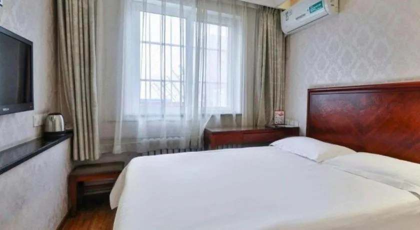 Bed in GreenTree Inn Beijing Daxing Xingye Street Liyuan Business Hotel
