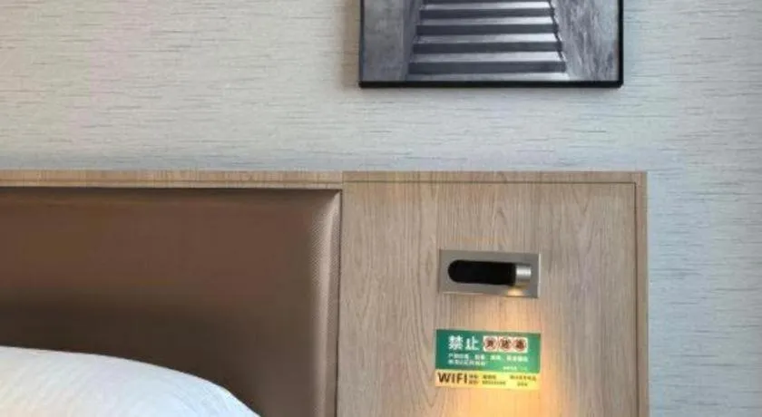 Bed in GreenTree Inn Ganzhou Sankang Temple DaRunFa Express Hotel