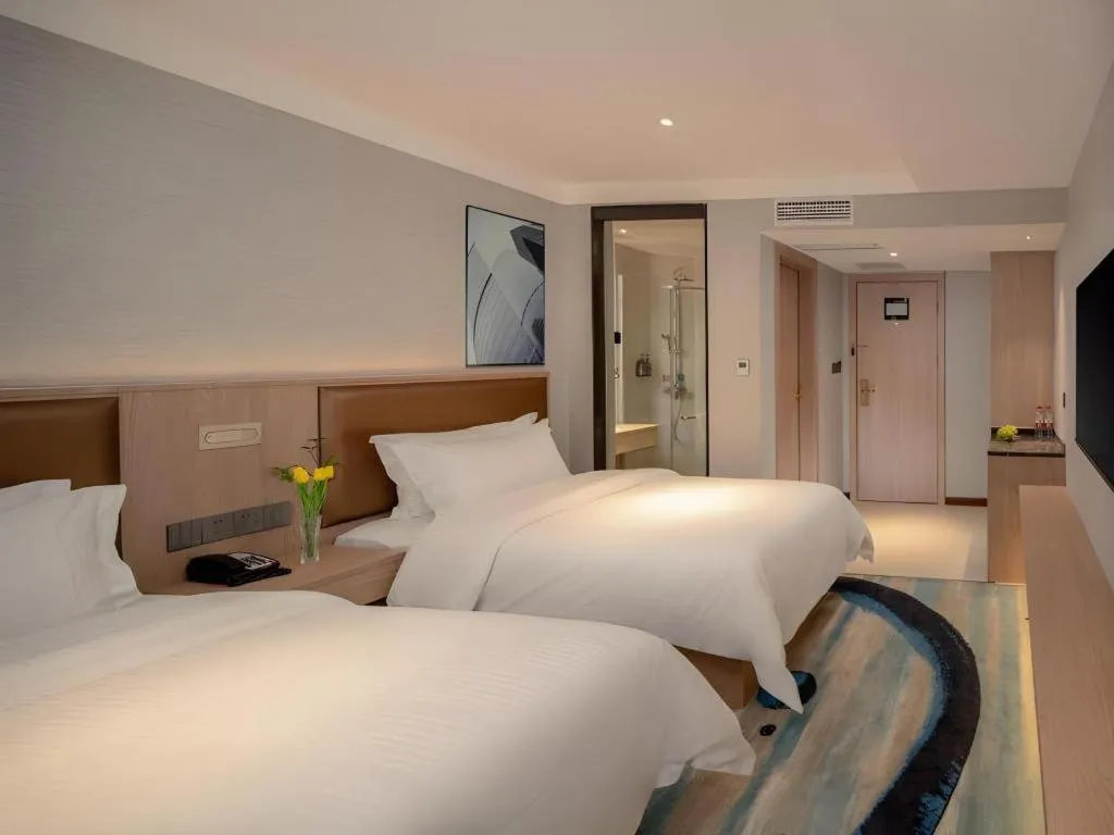 Bed in GreenTree Inn Ganzhou Sankang Temple DaRunFa Express Hotel