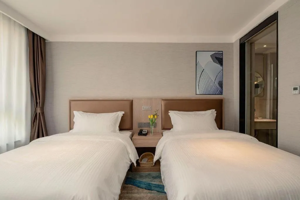 Bed in GreenTree Inn Ganzhou Sankang Temple DaRunFa Express Hotel