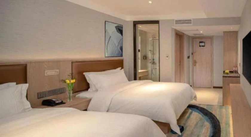 Bed in GreenTree Inn Ganzhou Sankang Temple DaRunFa Express Hotel