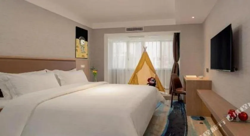 Bed in GreenTree Inn Ganzhou Sankang Temple DaRunFa Express Hotel