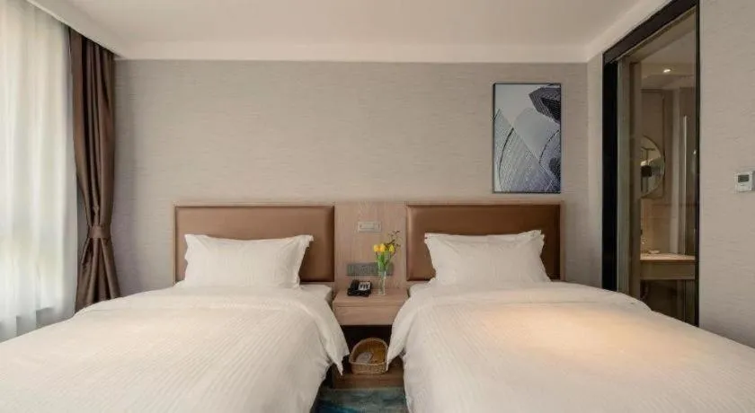 Bed in GreenTree Inn Ganzhou Sankang Temple DaRunFa Express Hotel