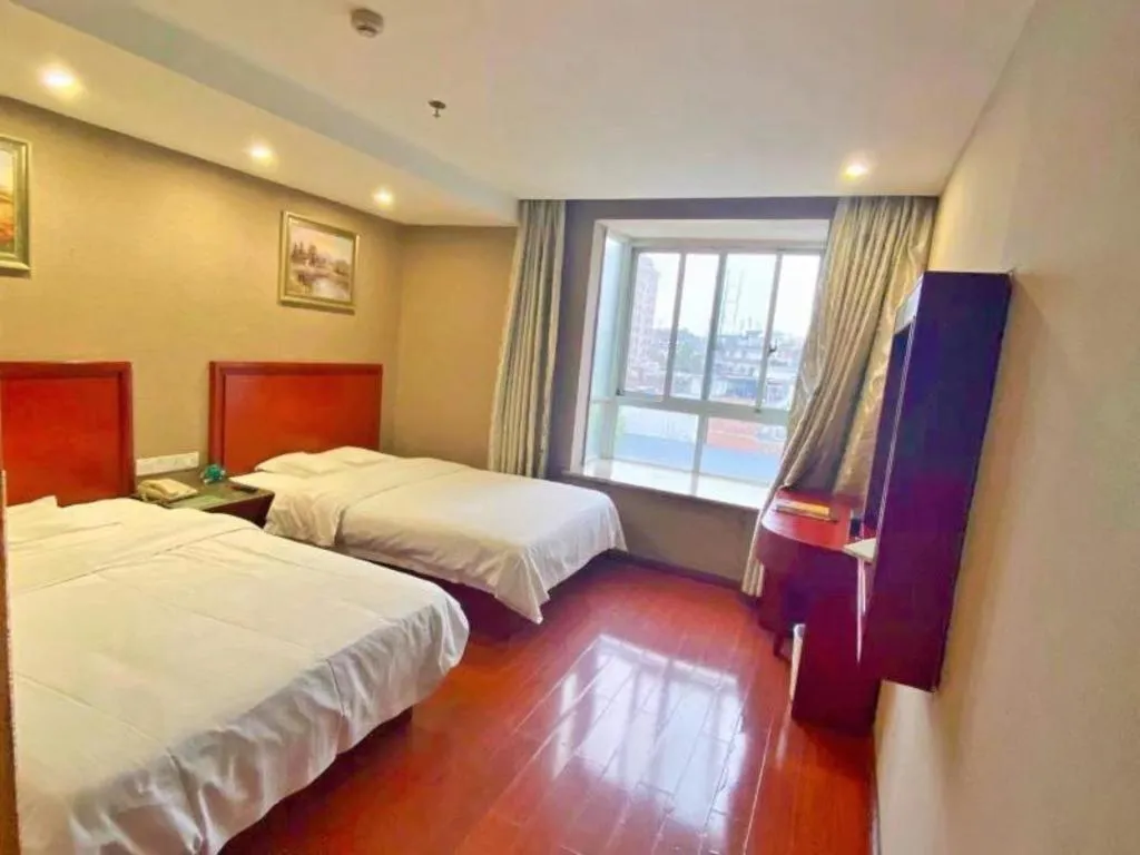 Bed in GreenTree Inn Ganzhou Sankang Temple DaRunFa Express Hotel